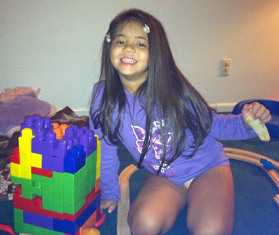 Buttery-faced Yaya with the absurdly sturdy fort she build for her imaginary friends