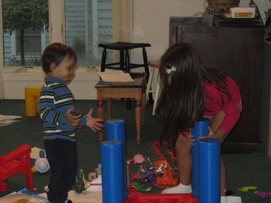 Yaya helps to put the table away even though Adik still wants to play