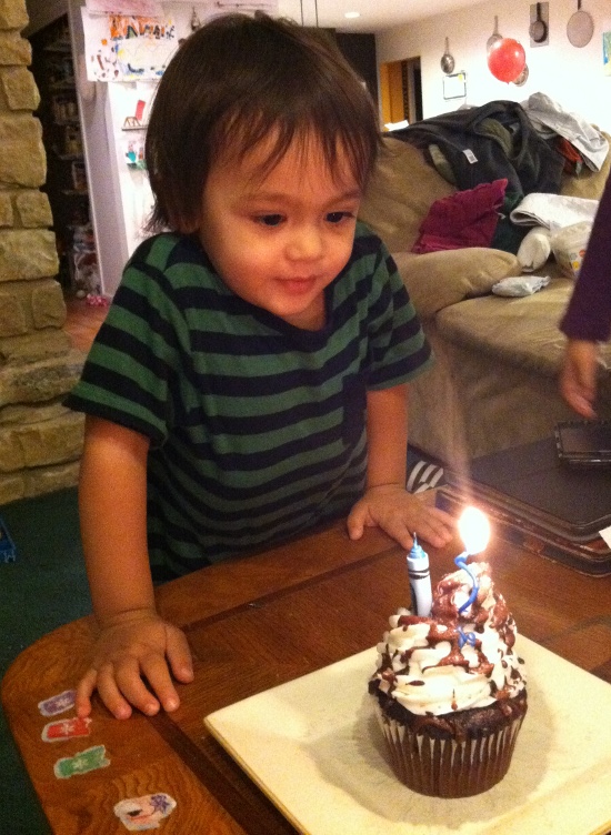 Adik blew the first candle out straight away!