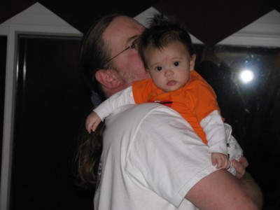 Drooling on Daddy's shoulder