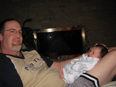 One of the first hanging out on Daddy's lap