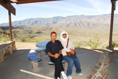 Mak and Abah relaxing at one of the picnic tables