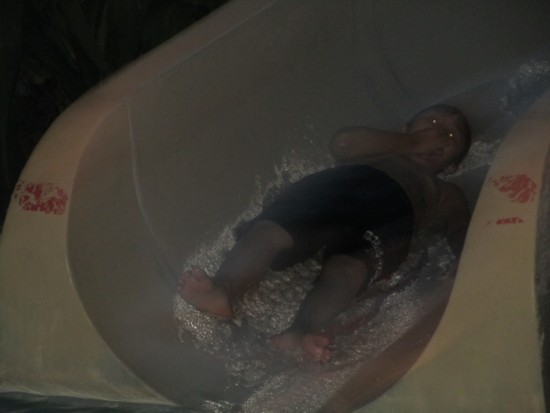 Irfan zooming down the water slide