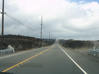 Road flanked by lava plains